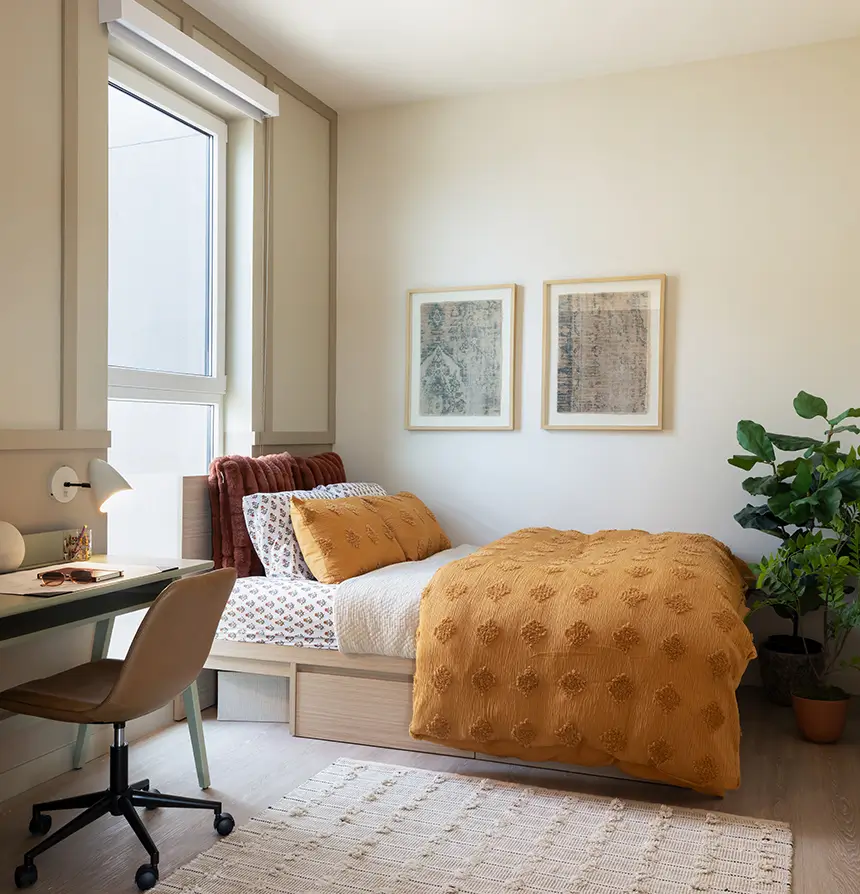 Furnished bedroom with desk